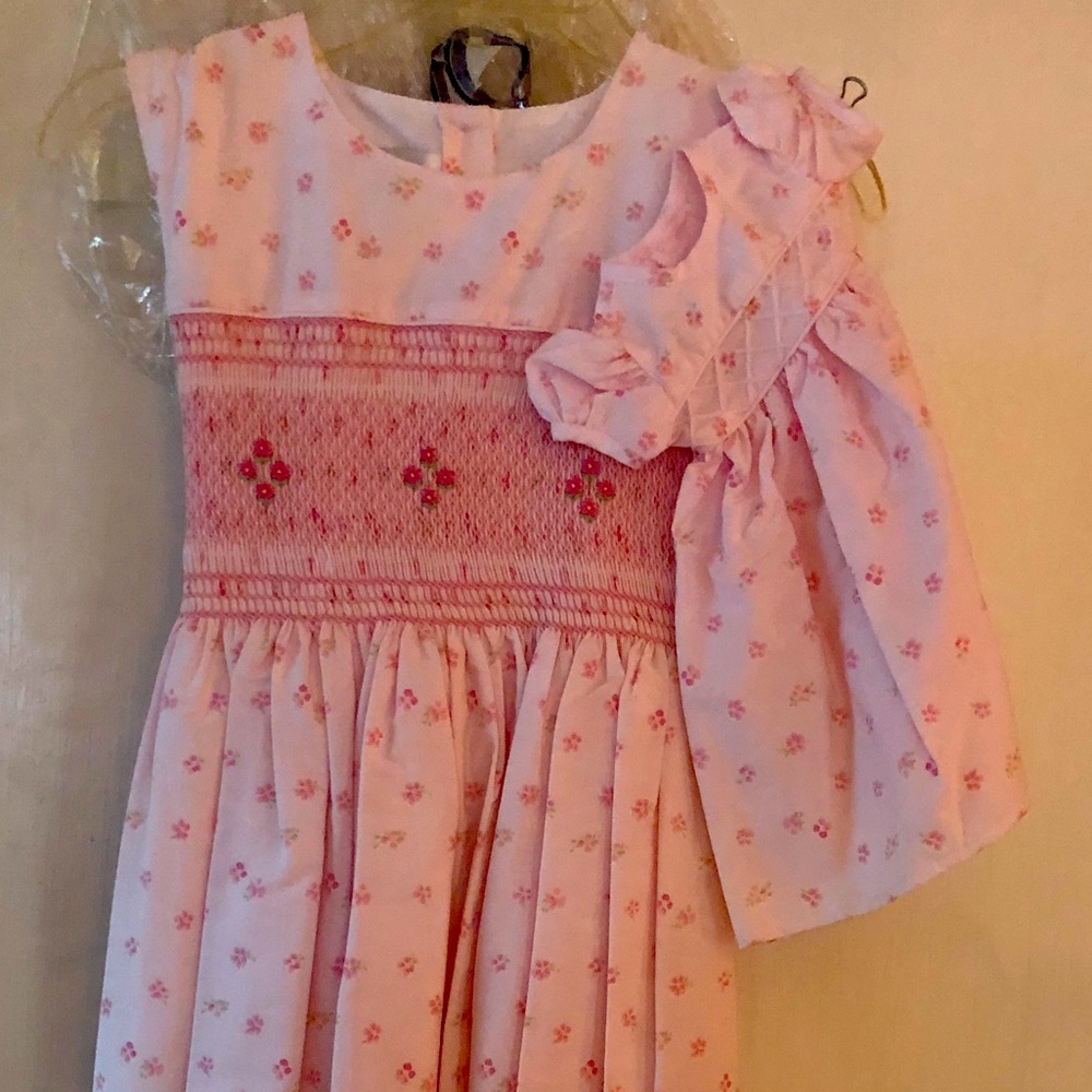 Pink smocked Strasburg dress, Sleeveless, size 10. Comes with doll’s dress!